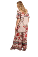 Calça Pantalona Com Abertura Em Uma Perna Bege Estampado Yacamim A7