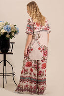 Calça Pantalona Com Abertura Em Uma Perna Bege Estampado Yacamim A7