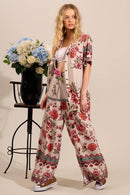 Calça Pantalona Com Abertura Em Uma Perna Bege Estampado Yacamim A7