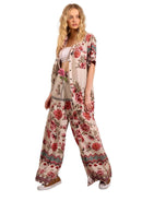 Calça Pantalona Com Abertura Em Uma Perna Bege Estampado Yacamim A7