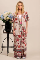 Calça Pantalona Com Abertura Em Uma Perna Bege Estampado Yacamim A7